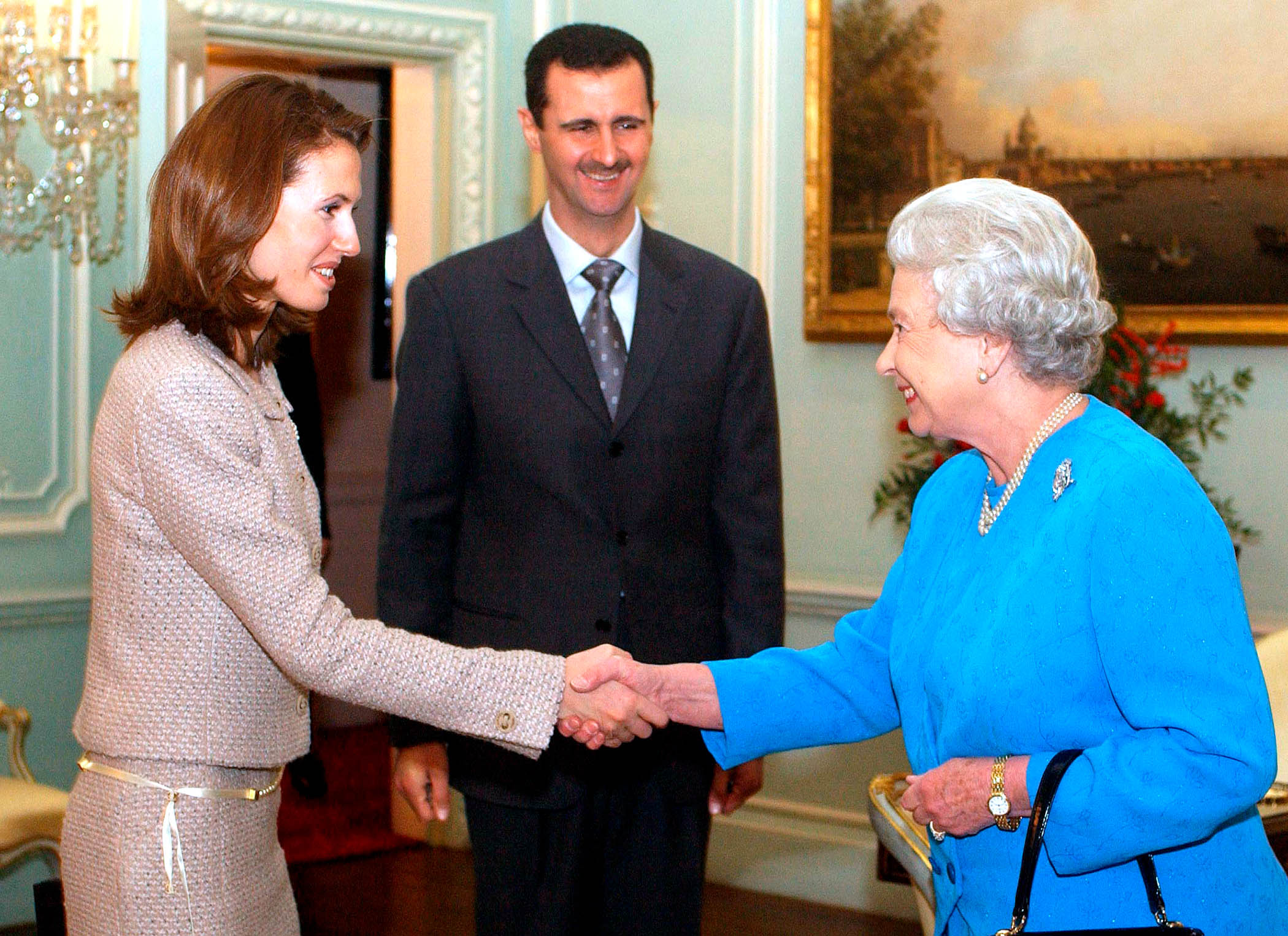 Asma and Assad meet the Queen at Buckingham Palace in 2002.