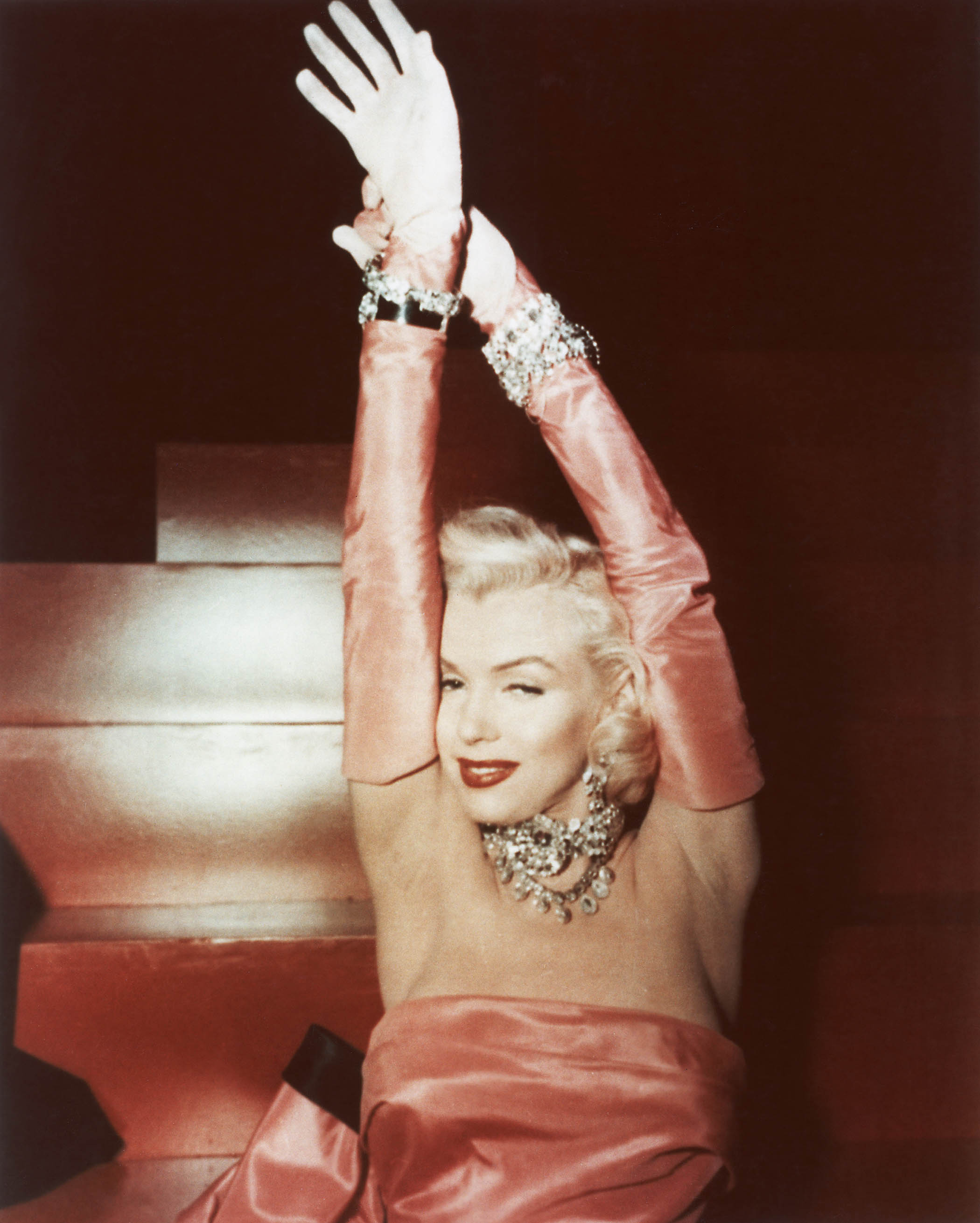 ‘She made a photograph like nobody else, before or since’: Marilyn Monroe in a scene from 1953’s Gentlemen Prefer Blondes. Main image, photographed with Arthur Miller by Sam Shaw