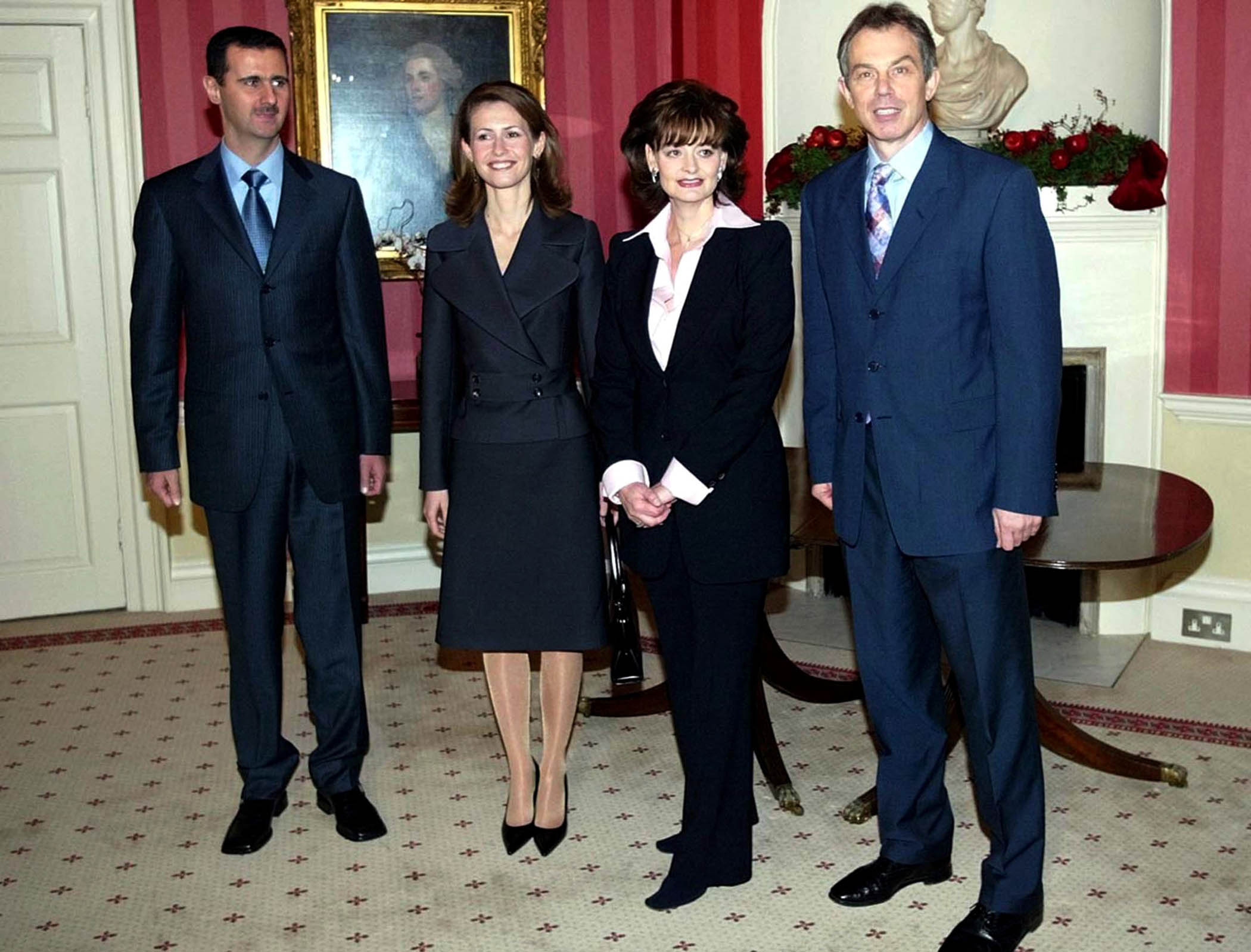 Bashar al-Assad and Asma pose with Cherie and Tony Blair inside No 10 in December 2002.