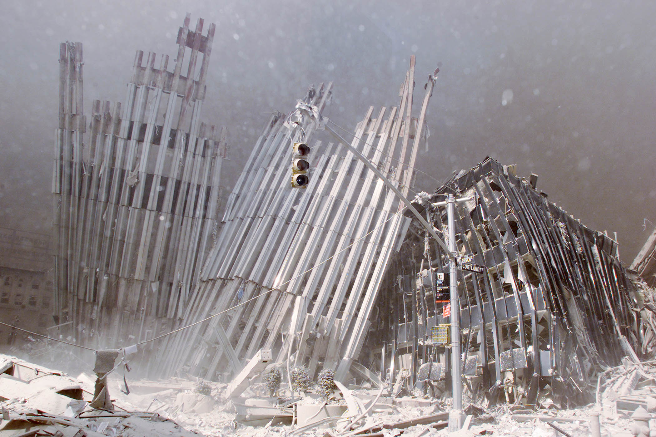 One of the World Trade Center towers lies in ruins after the terrorist attack in New York City, 11 September 2001. 
