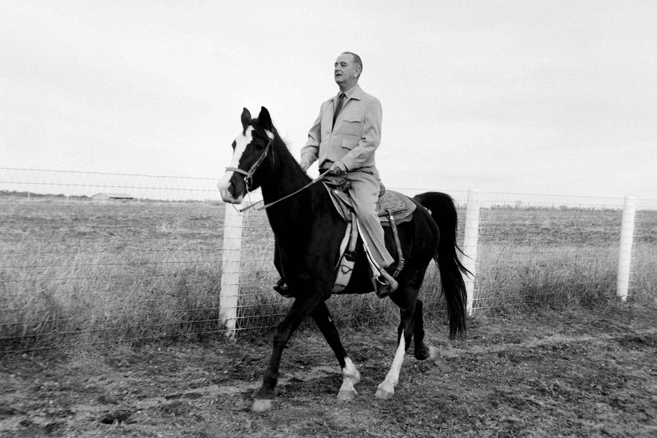 President Lyndon B Johnson riding on his ranch in Texas, 1963.