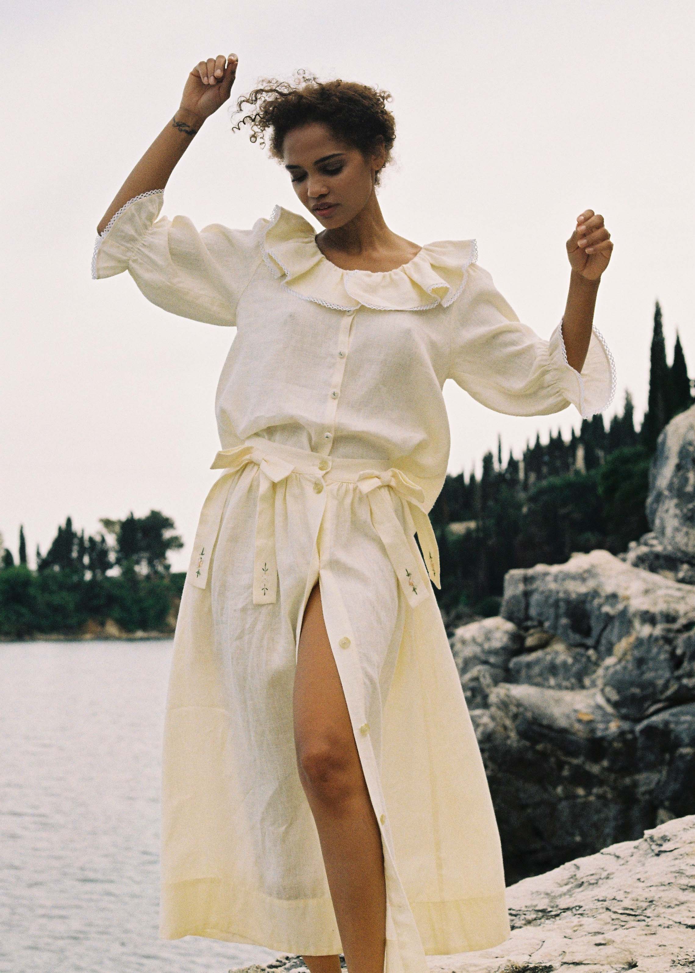 Crafted with careBy Søren is a low-impact British luxury womenswear brand, launched in 2023 by founder Henny Clarke. The all-female collective of creators and makers works with the UK’s last lace factory, button factory and one of the few remaining independent heritage weavers still producing traditional British woollens. By Søren’s dedication to slow-fashion principles ensures each garment is crafted using carefully considered fabrics and trimmings. Leftover materials are individually hand-embroidered and transformed into distinctive buttons, made from sustainably harvested horn, natural corozo nut, and biodegradable milk casei. Inspired by nature the collections have a timeless aesthetic to wear for years to come.Blouse, £275 and skirt £280, By Søren.