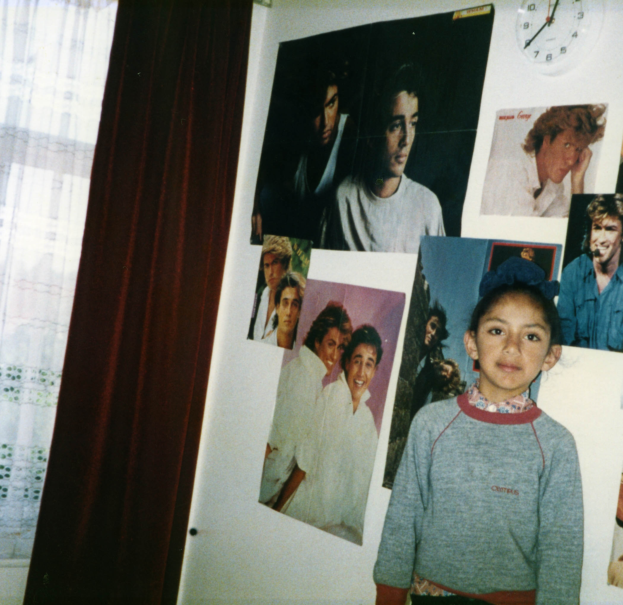Sathnam Sanghera as a nine-year-old in front of his George Michael and Wham posters.