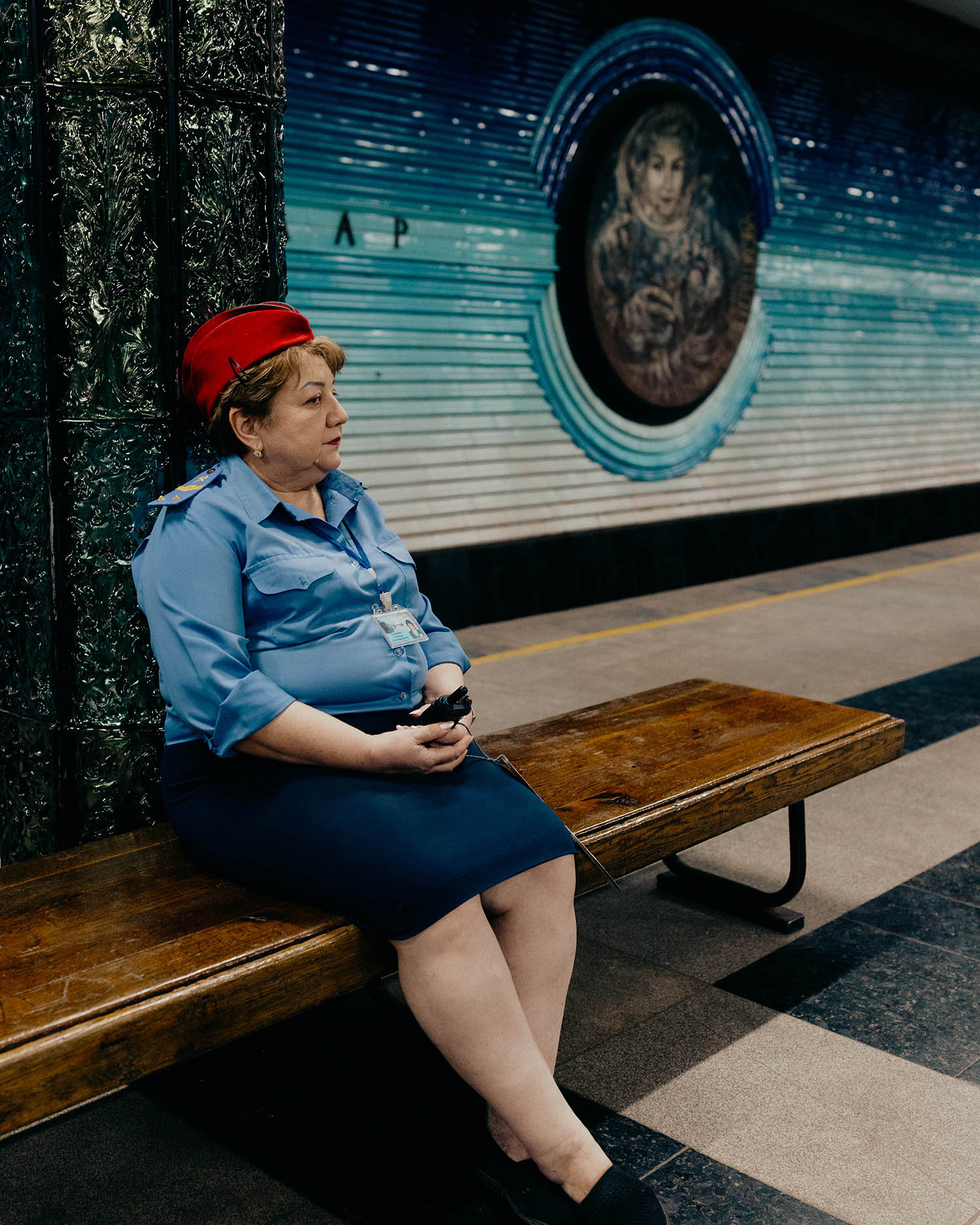 Tickets please: a metro guard at Kosmonavtlar station