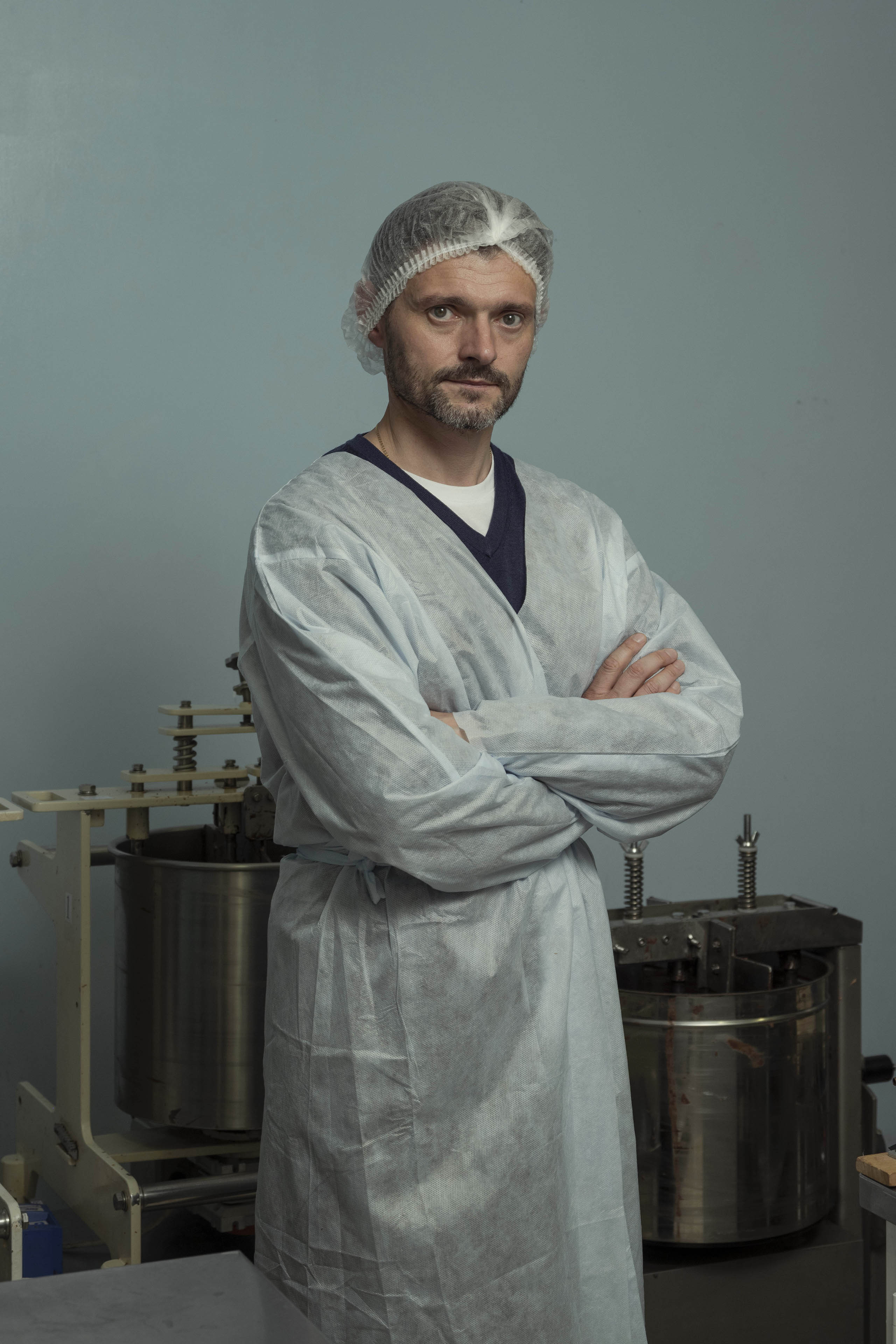 ‘Life has prepared us, step by step, for what once seemed unimaginable’: Oleksiy Kolchanov in his chocolatier’s clothes, and above, in uniform