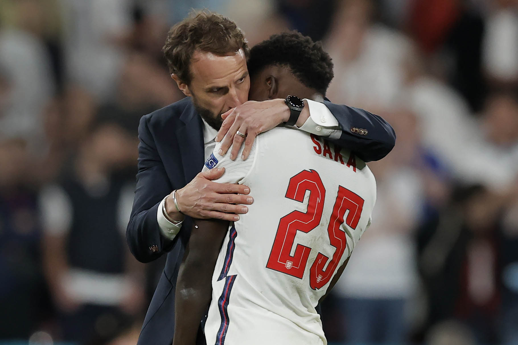 Southgate with Bukayo Saka after his decisive miss in the penalty shootout gave Italy victory during the Euro 2020 final at Wembley Stadium in 2021