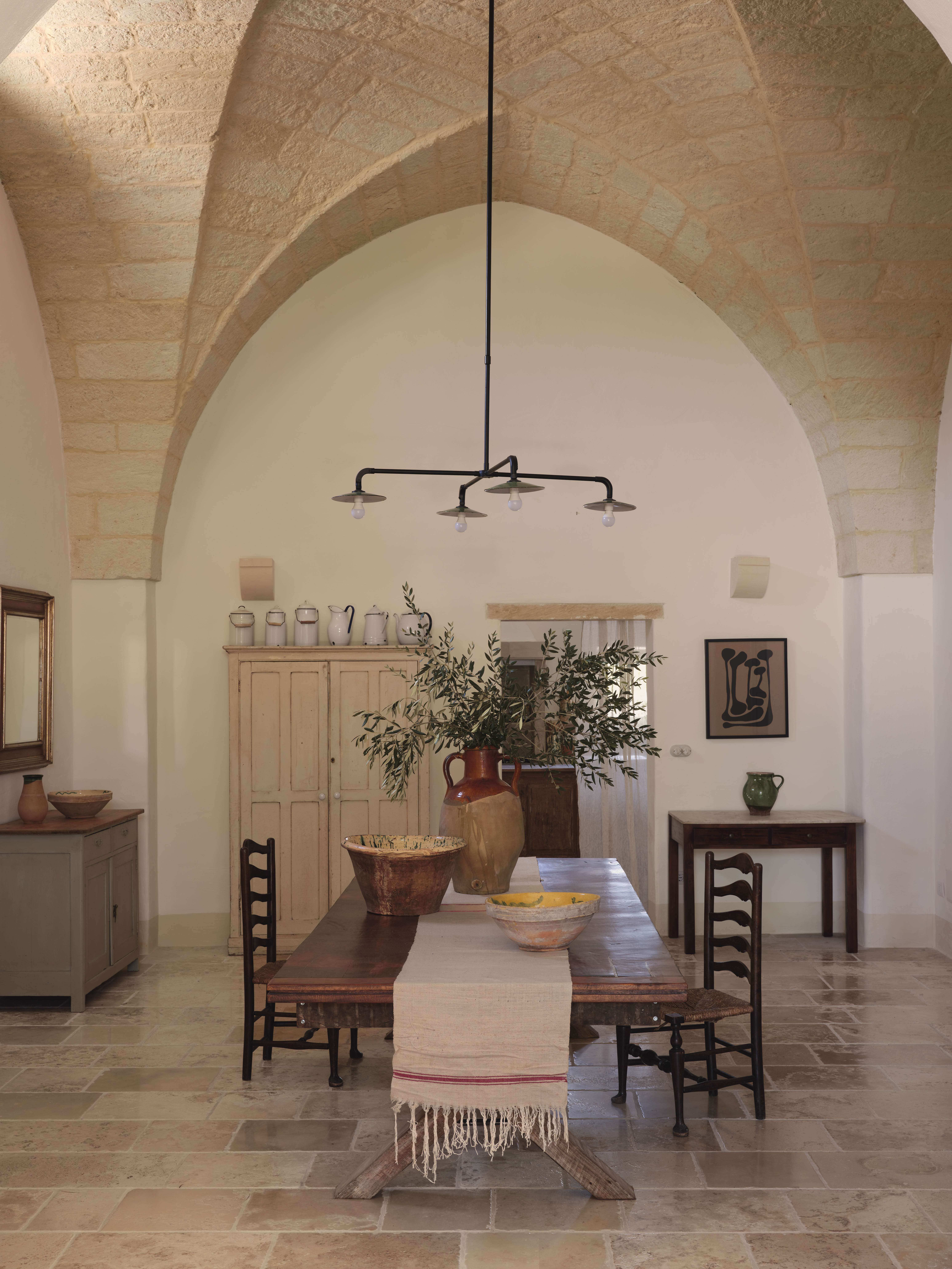 Italian classics: the walls and floor in the dining room have been restored using traditional techniques