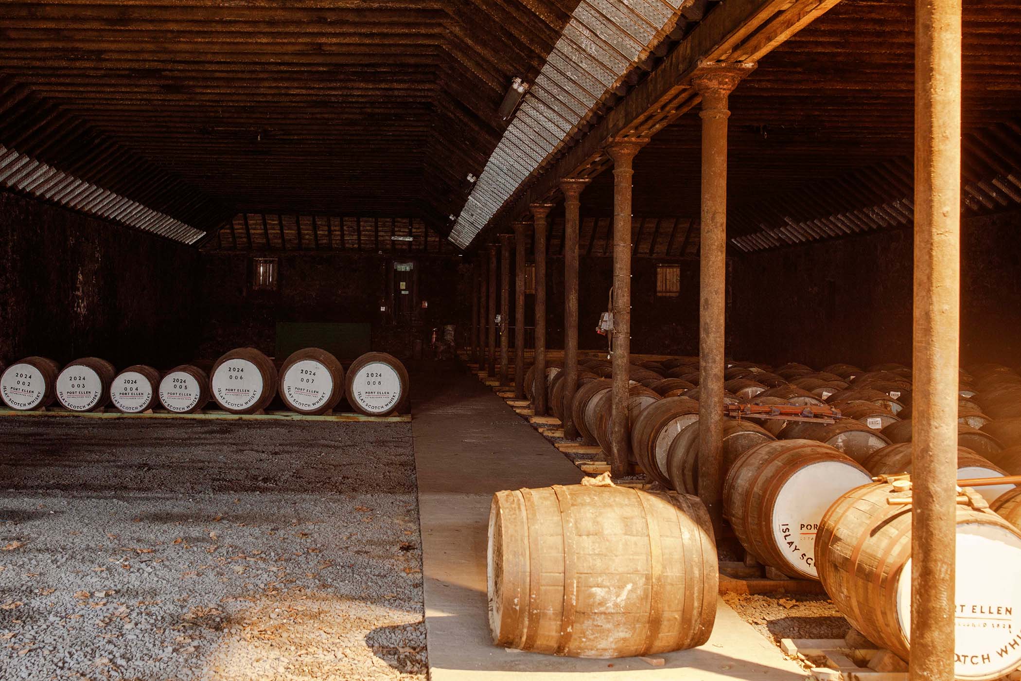 Roll out the barrel: whisky cask inside the distillery warehouse